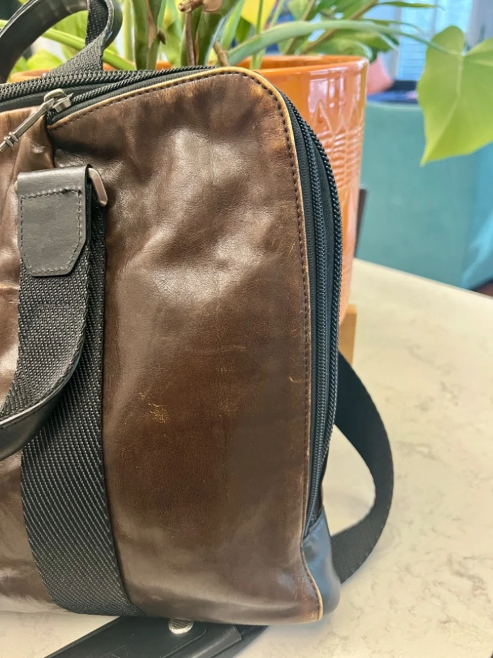 TUMI men's leather briefcase/laptop bag